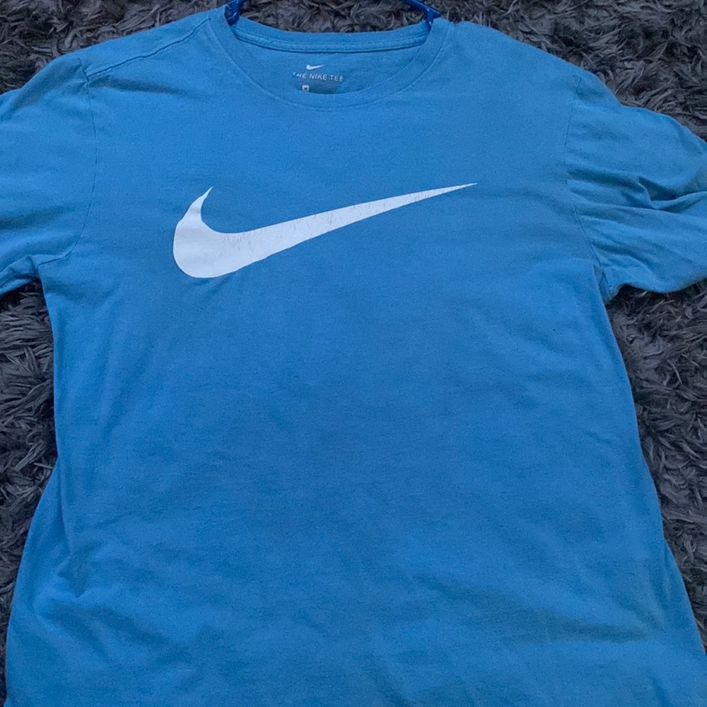 Light blue Nike shirt